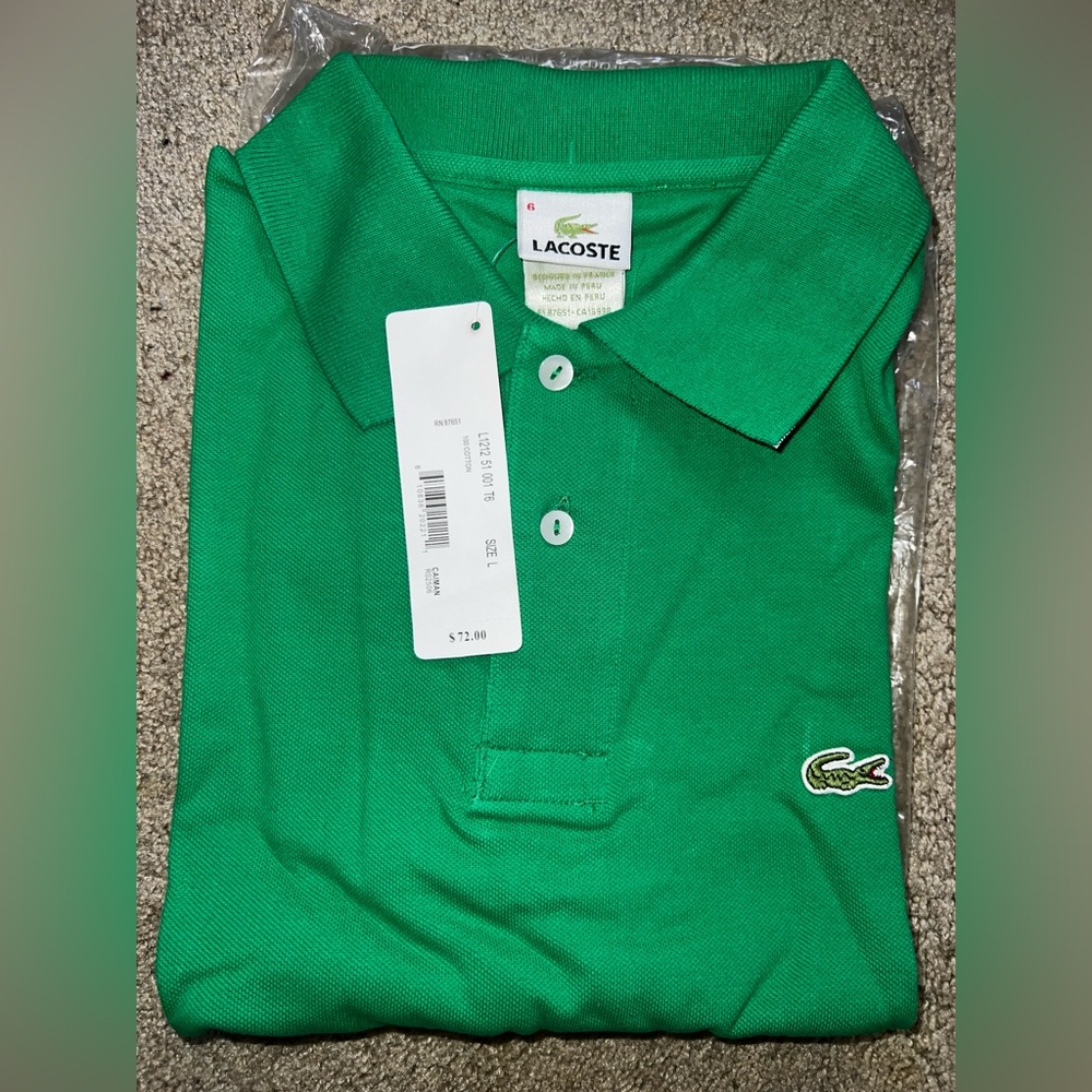 Brand New Lacoste polo shirt Large 
New with tags never worn, kelly green